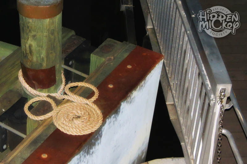 A hidden Mickey made from rope loops on a dock